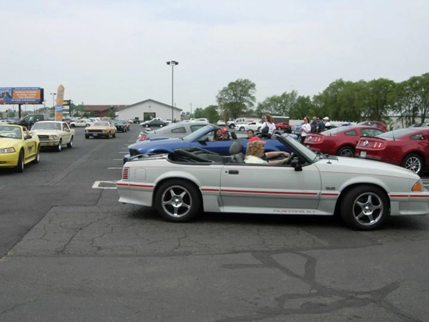 Vintage car show with attendees