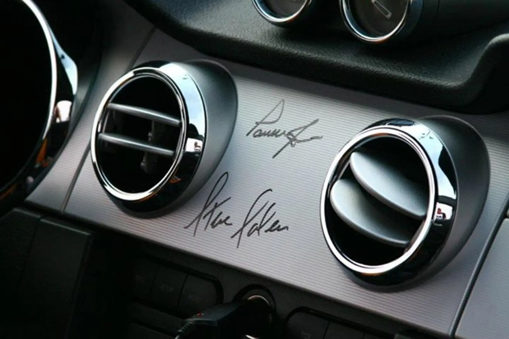 Dashboard featuring signatures and vents