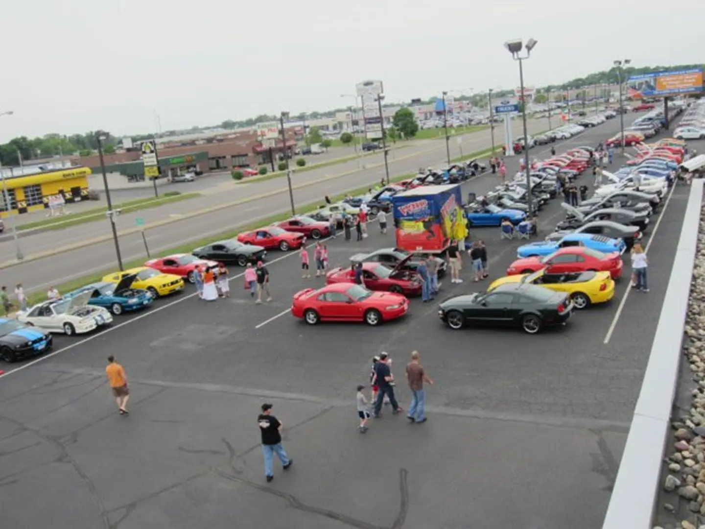 Parking lot filled with various cars
