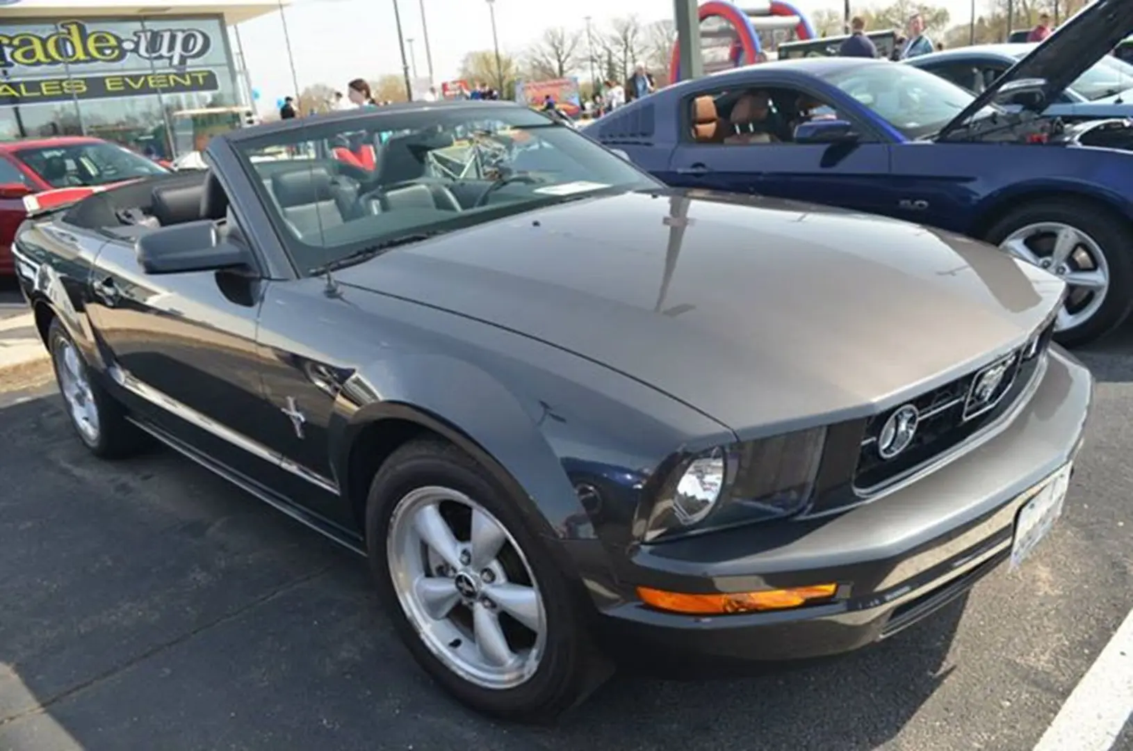 Gray convertible parked outdoors