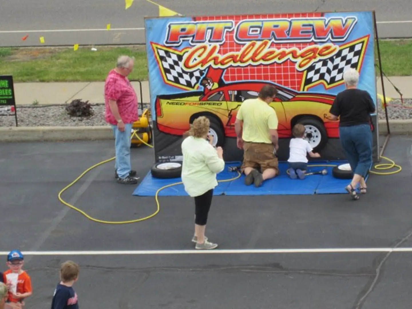 Family enjoying pit stop activity