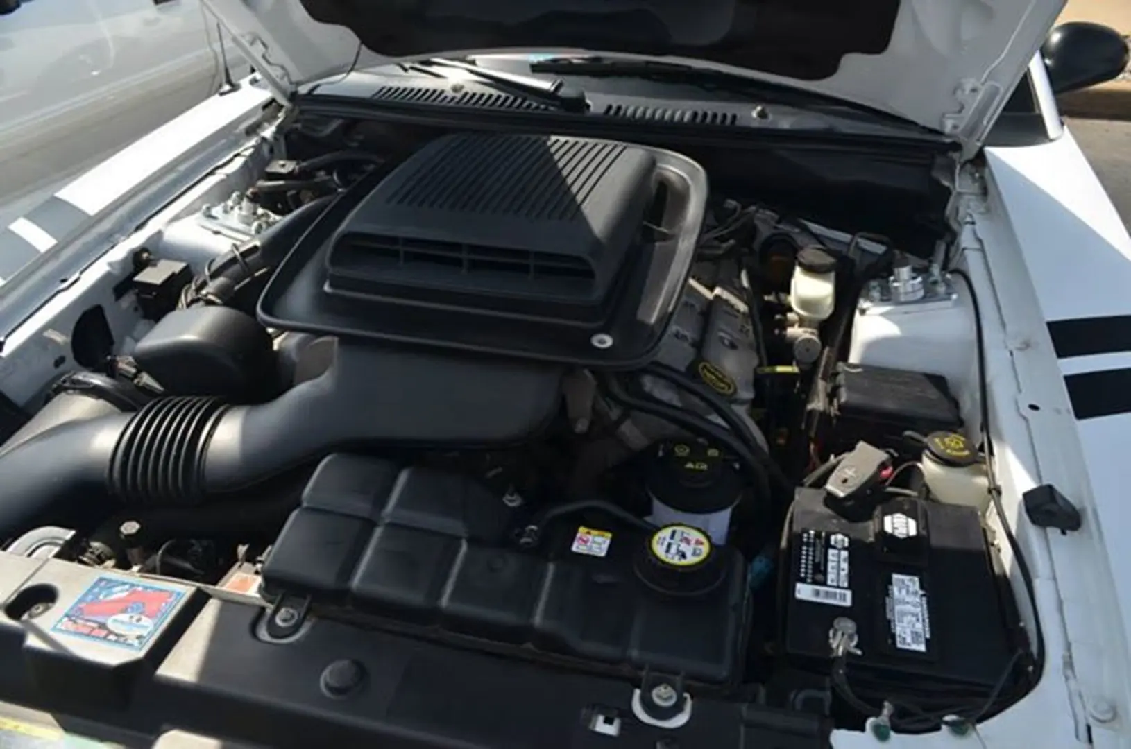 Car engine with open hood