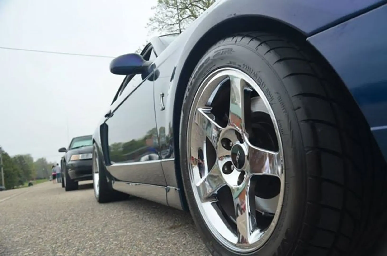 Low-angle view of parked vehicles