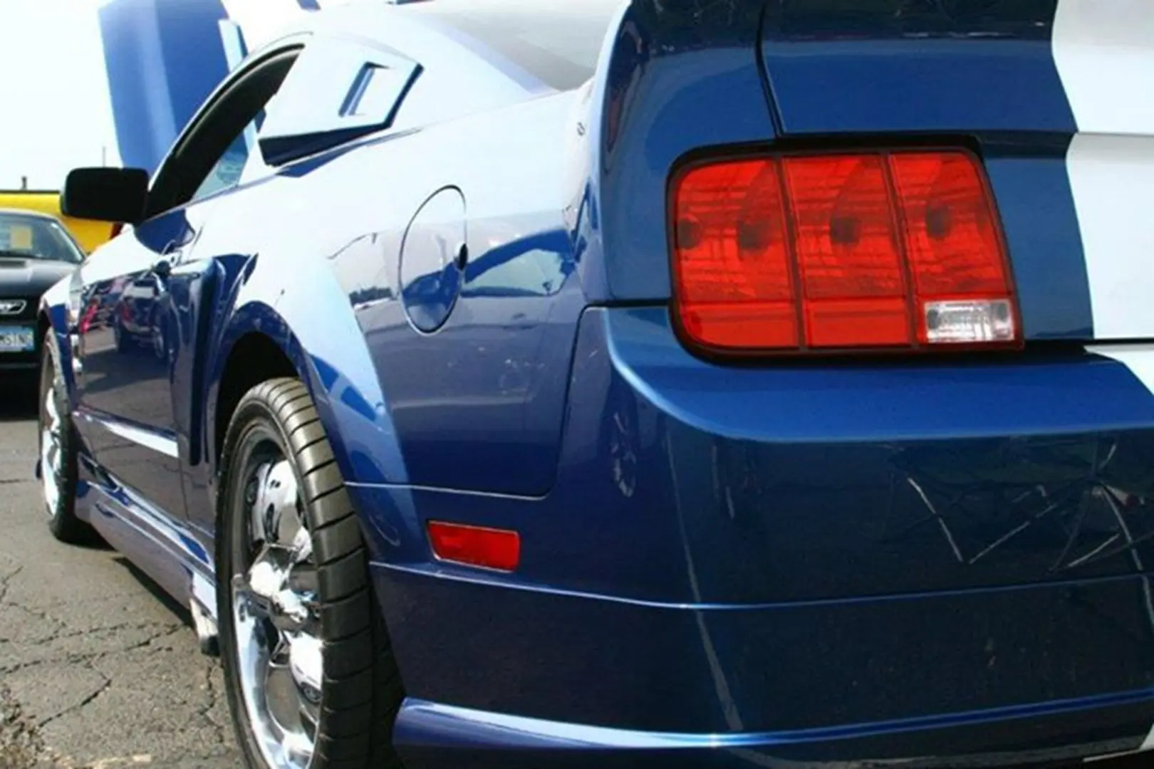 Sleek blue vehicle on pavement