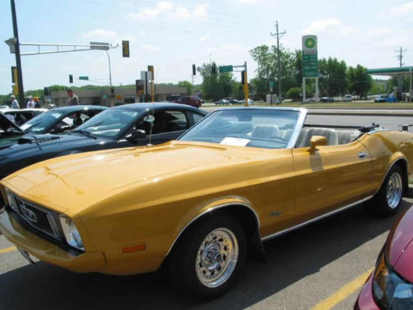 Retro yellow convertible at car event