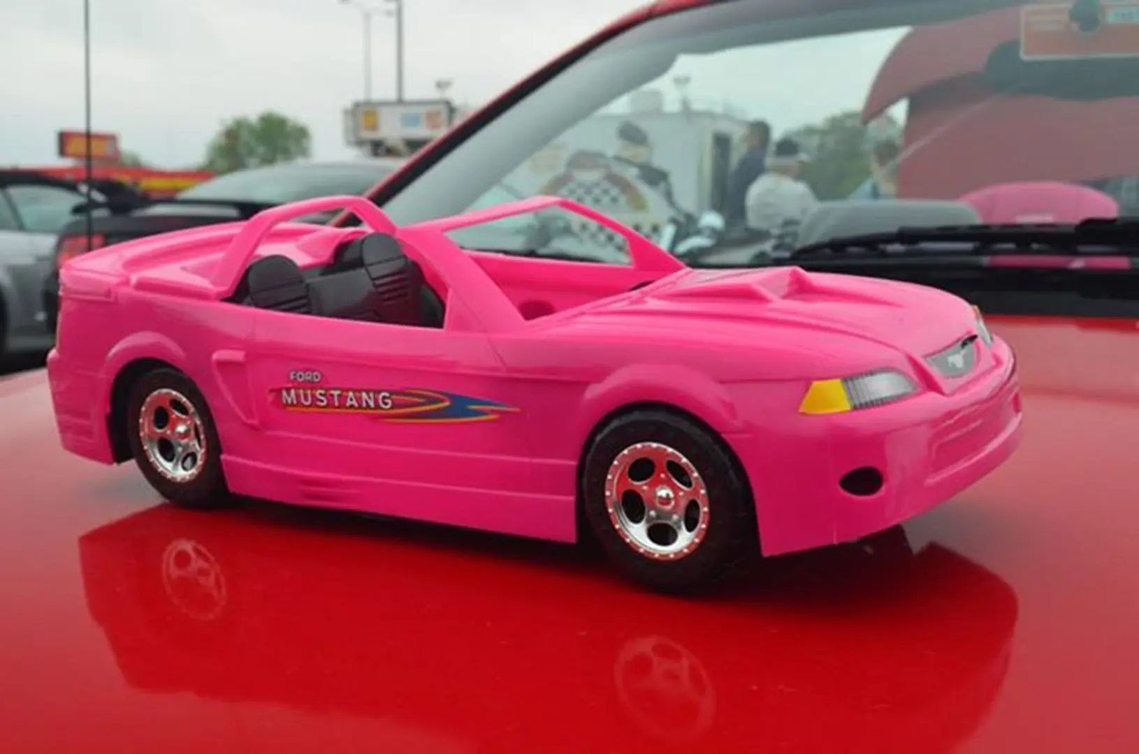 Miniature pink convertible model car
