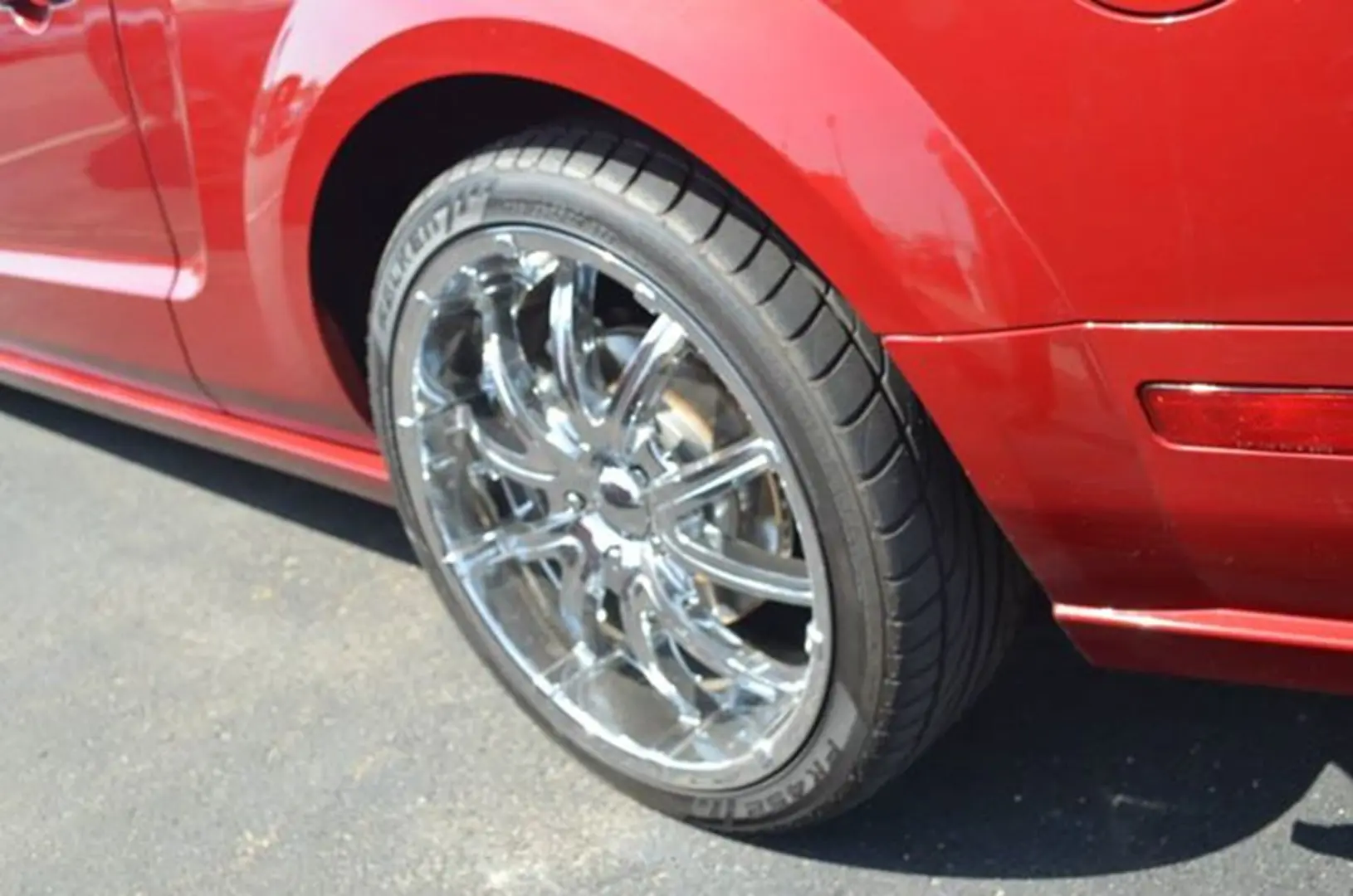 Stylish rim on red vehicle