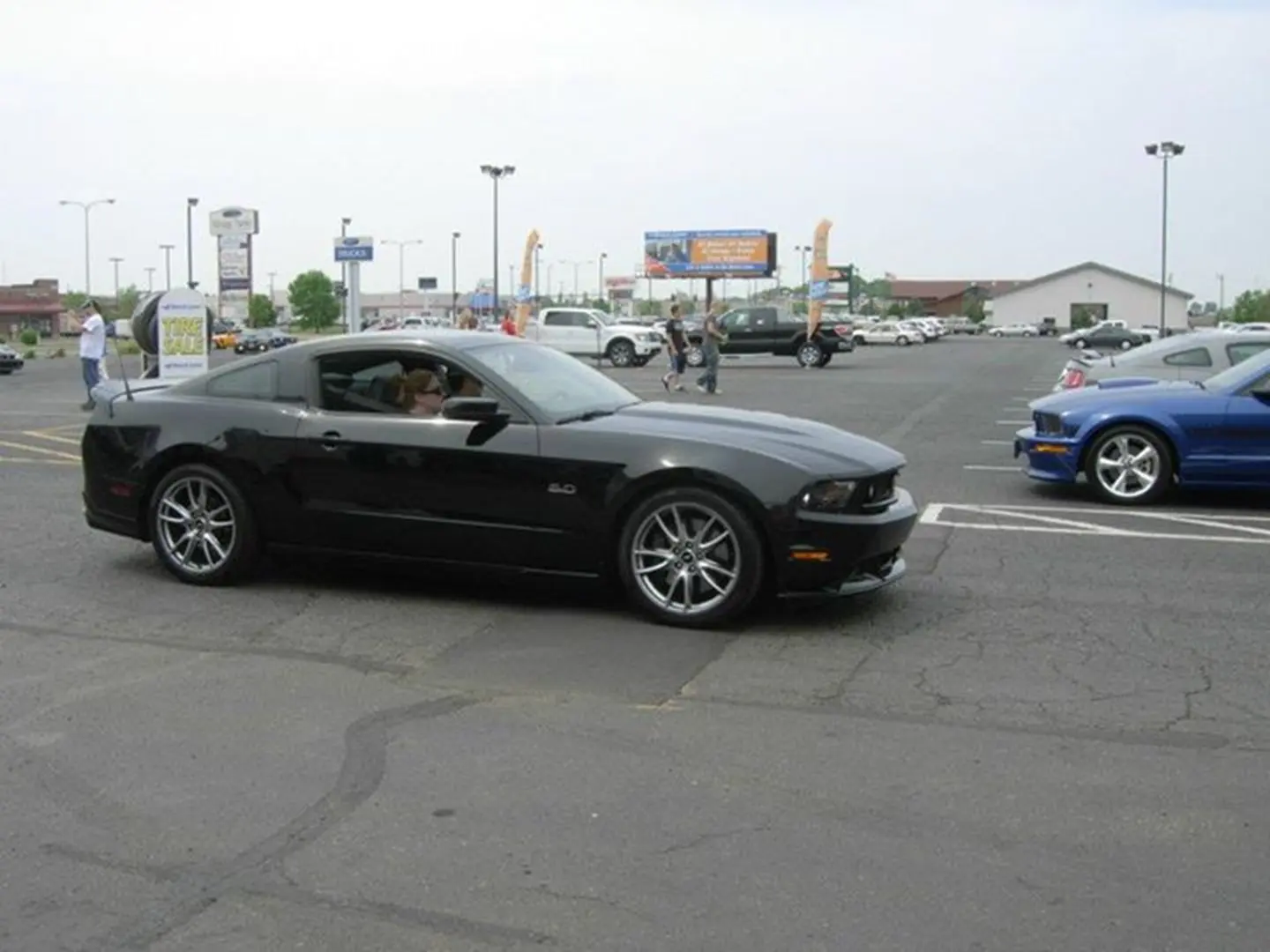Sleek black car on asphalt