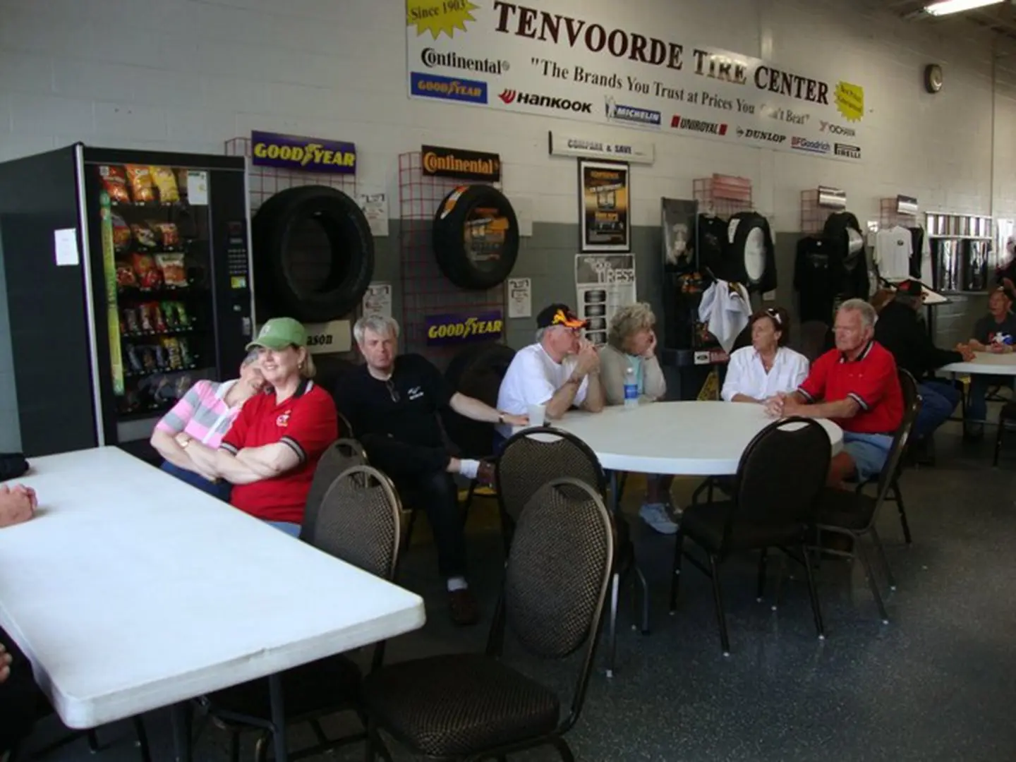 People sitting in a tire center waiting area