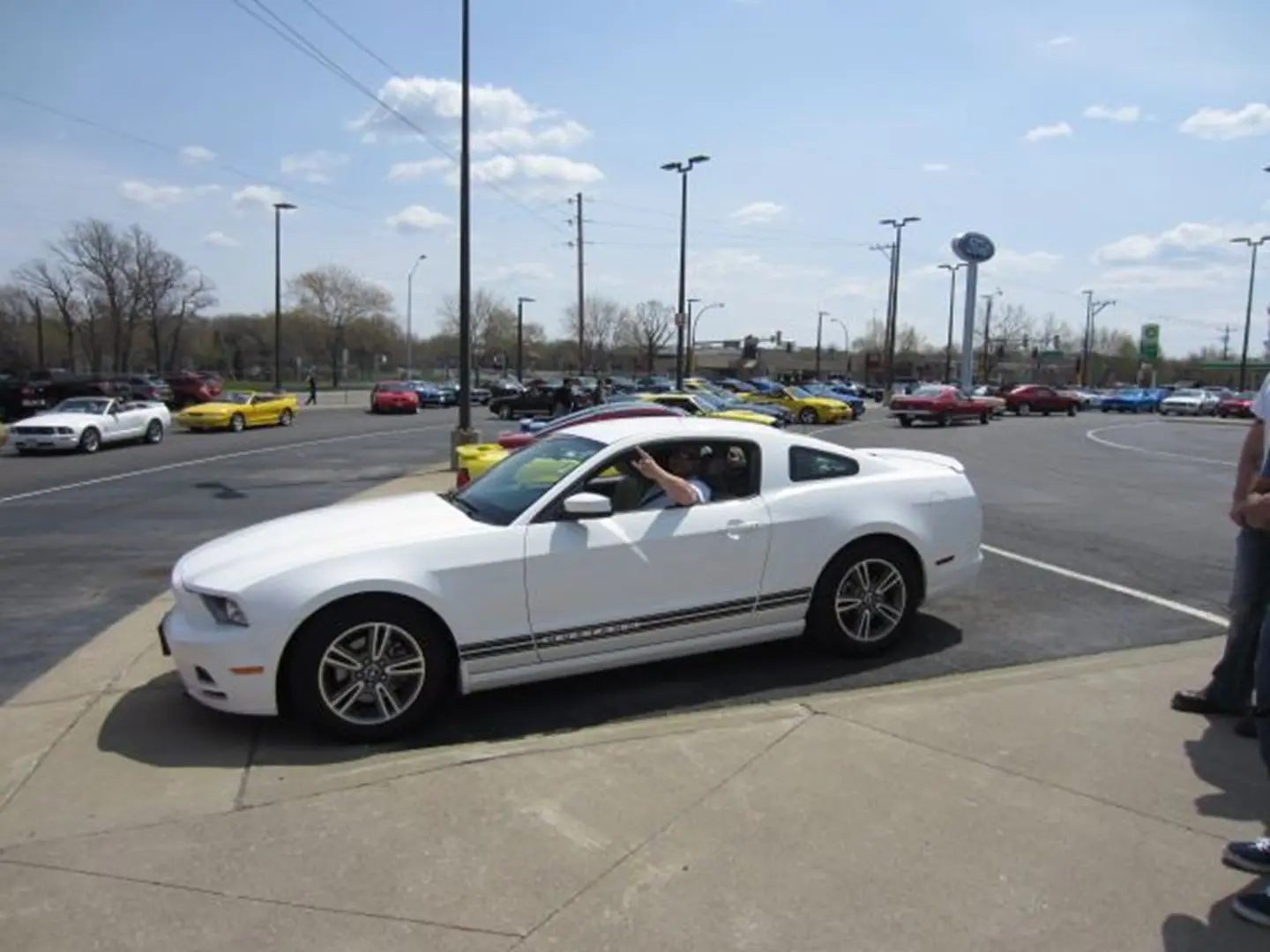 Man driving white sports car