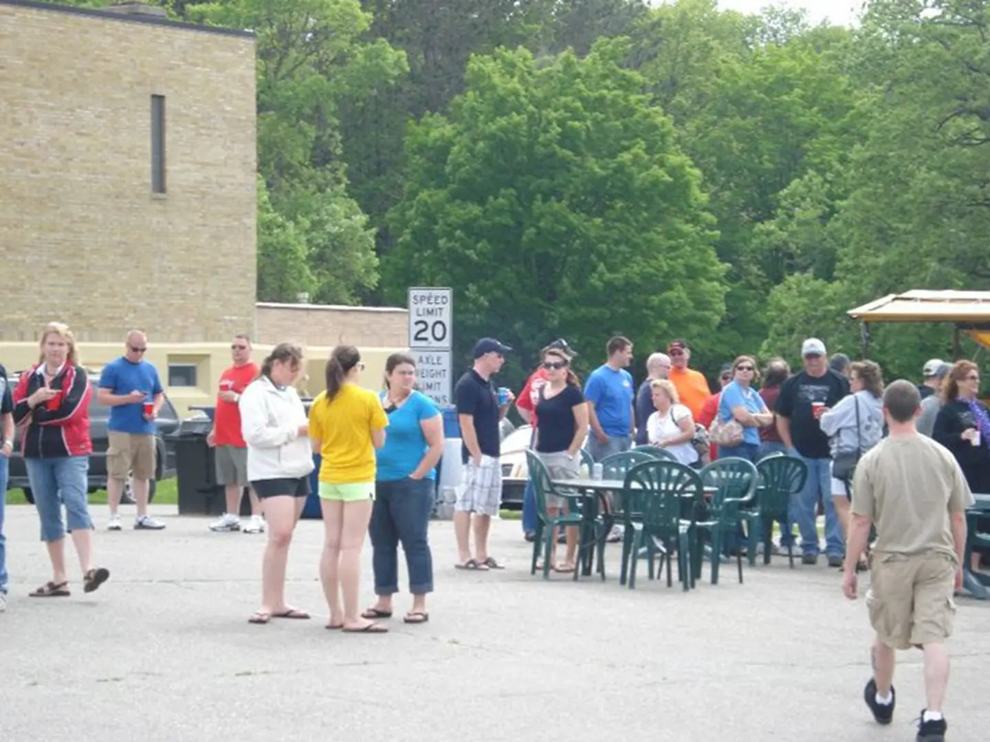 Outdoor gathering with people in line