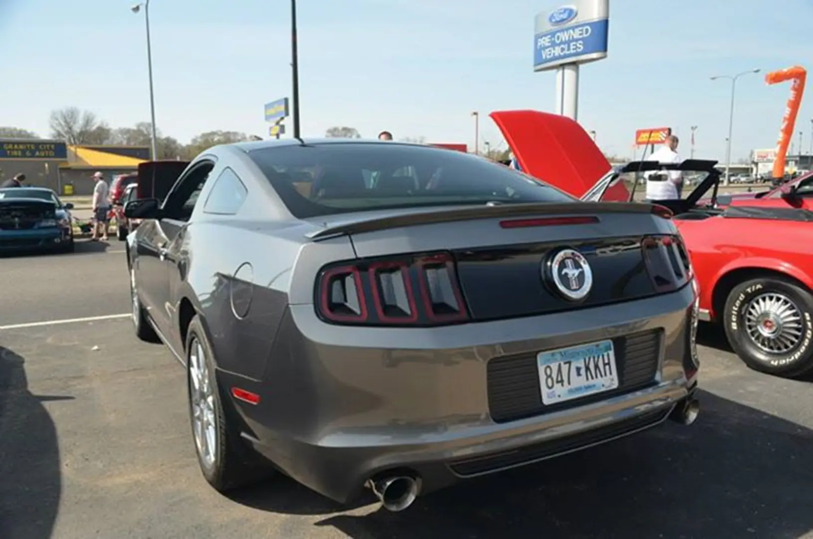 Gray sports car parked at dealership