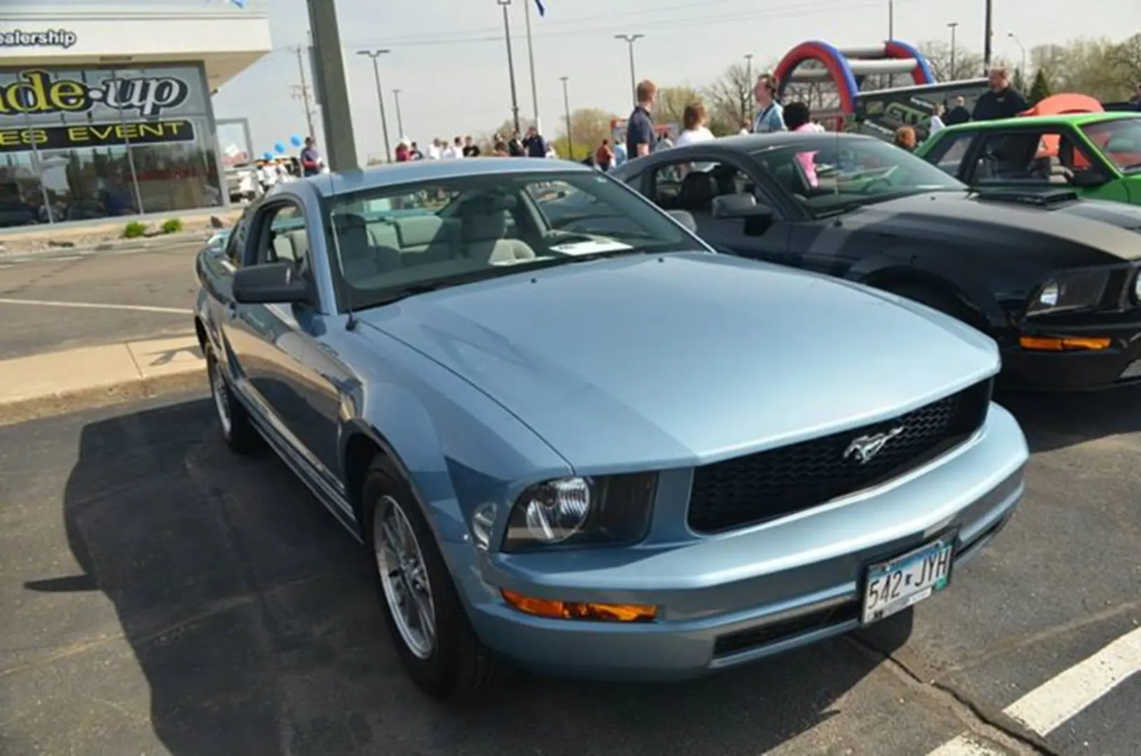 Shiny Mustang parked outdoors