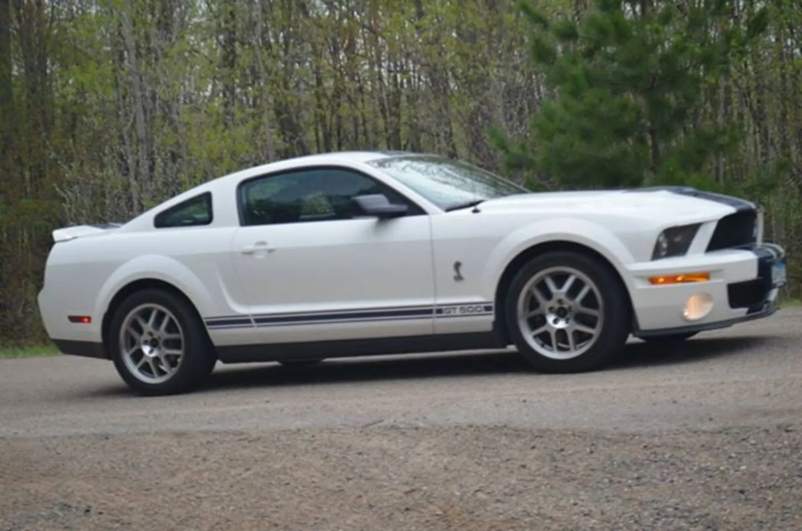Classic white car with stripes