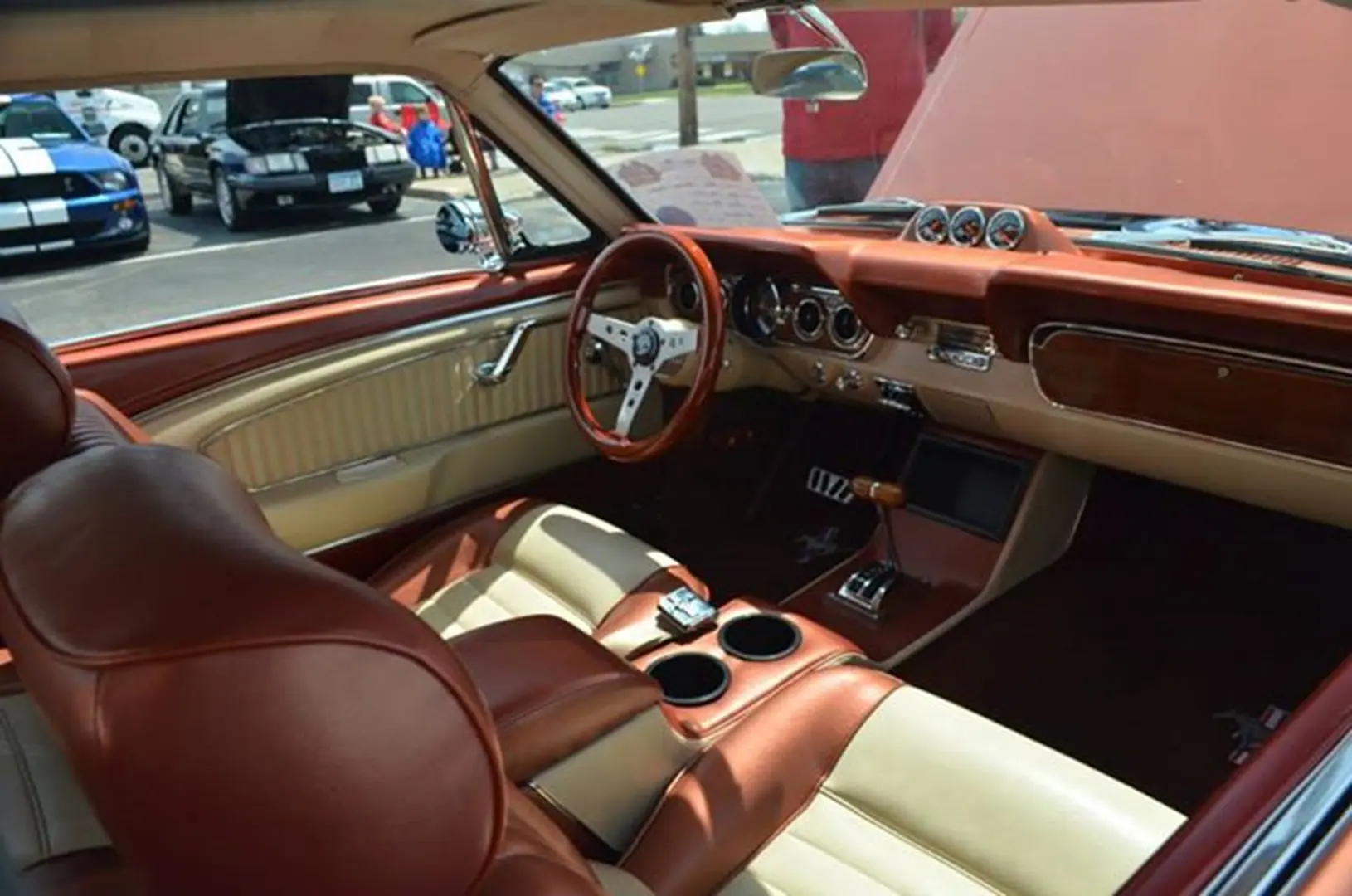 Retro car cabin featuring wood accents