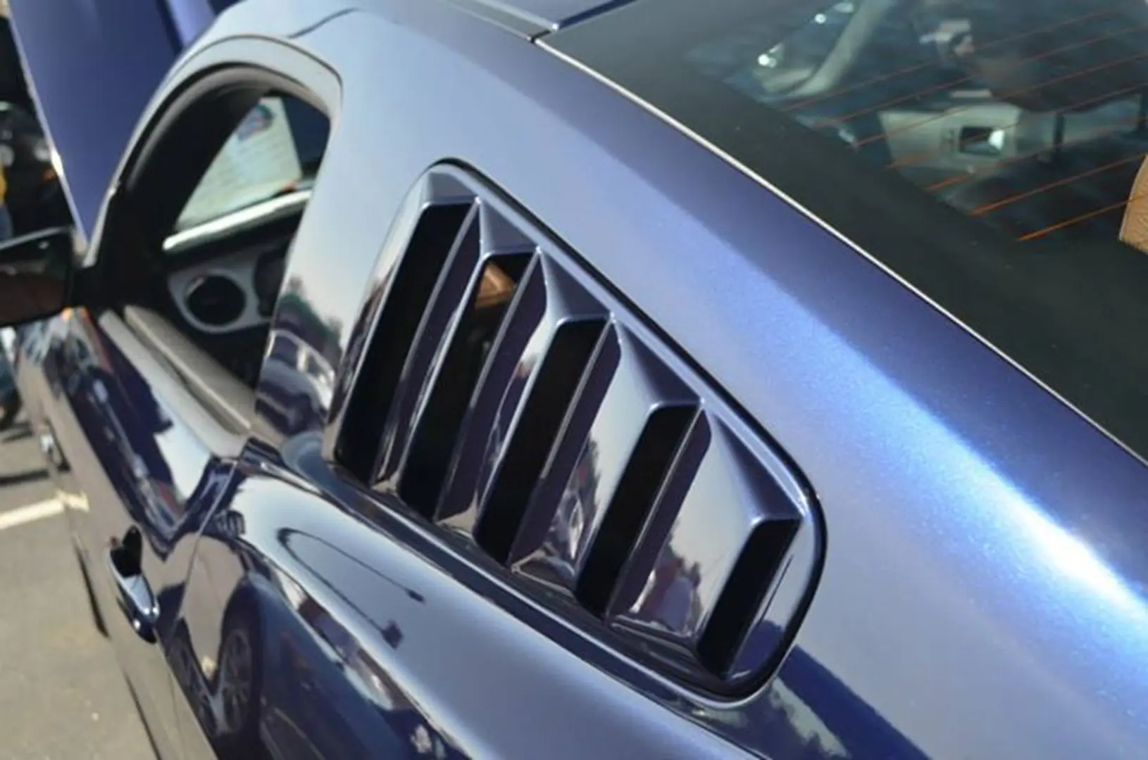 Sports car with blue exterior detail