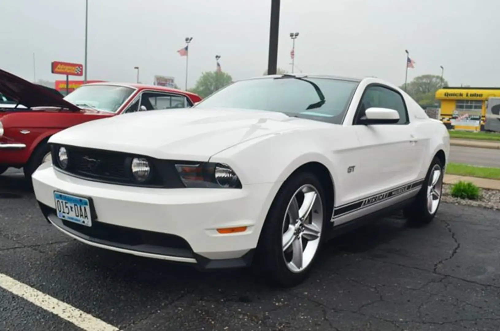 Sleek white car parked outdoors