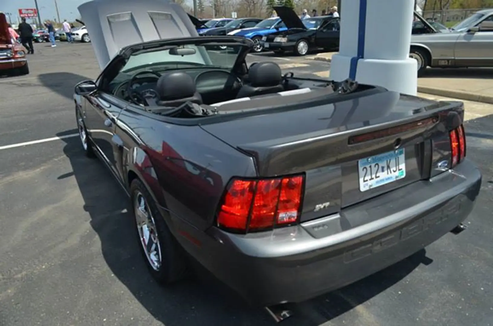 Gray convertible with raised hood