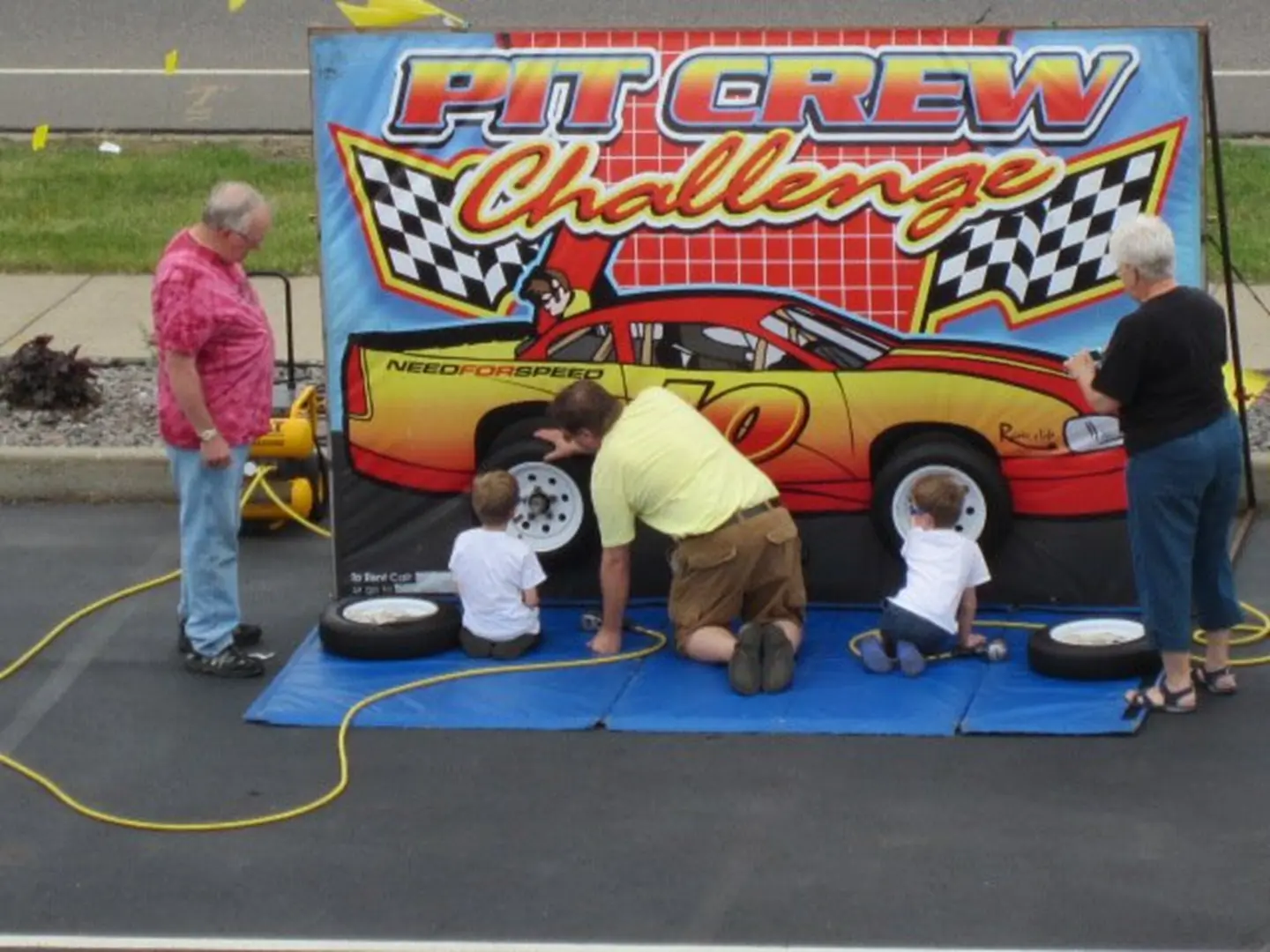 Children participating in pit crew challenge