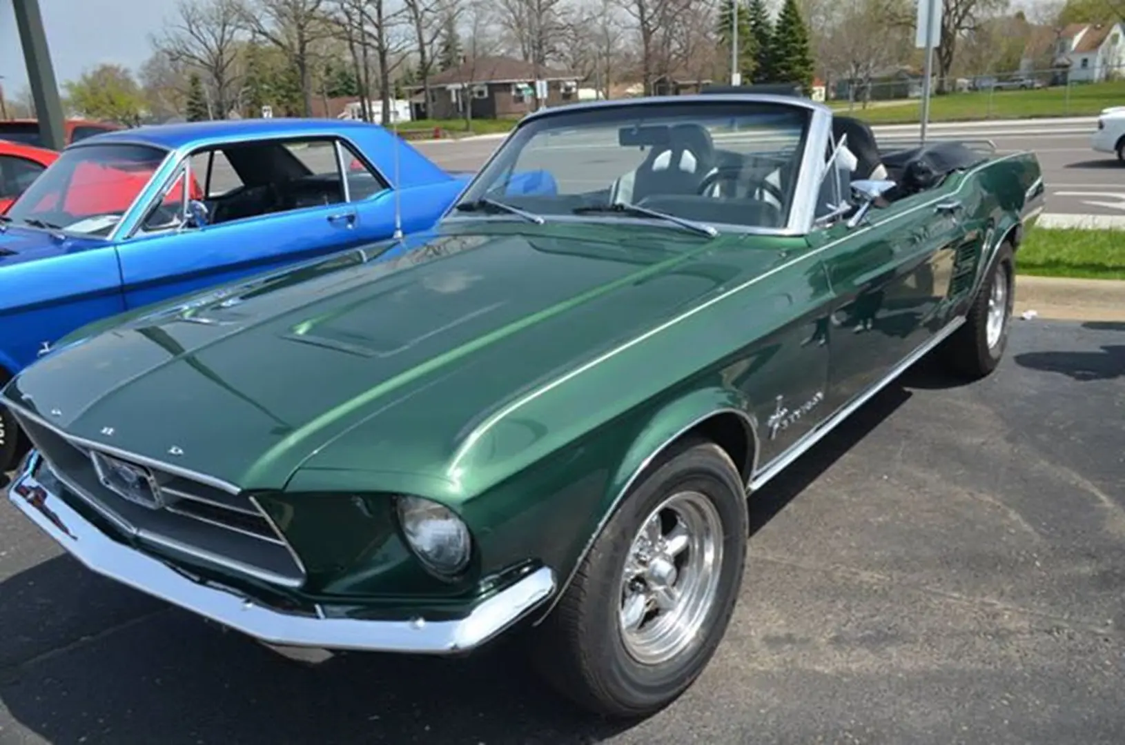 Green vintage convertible car on display