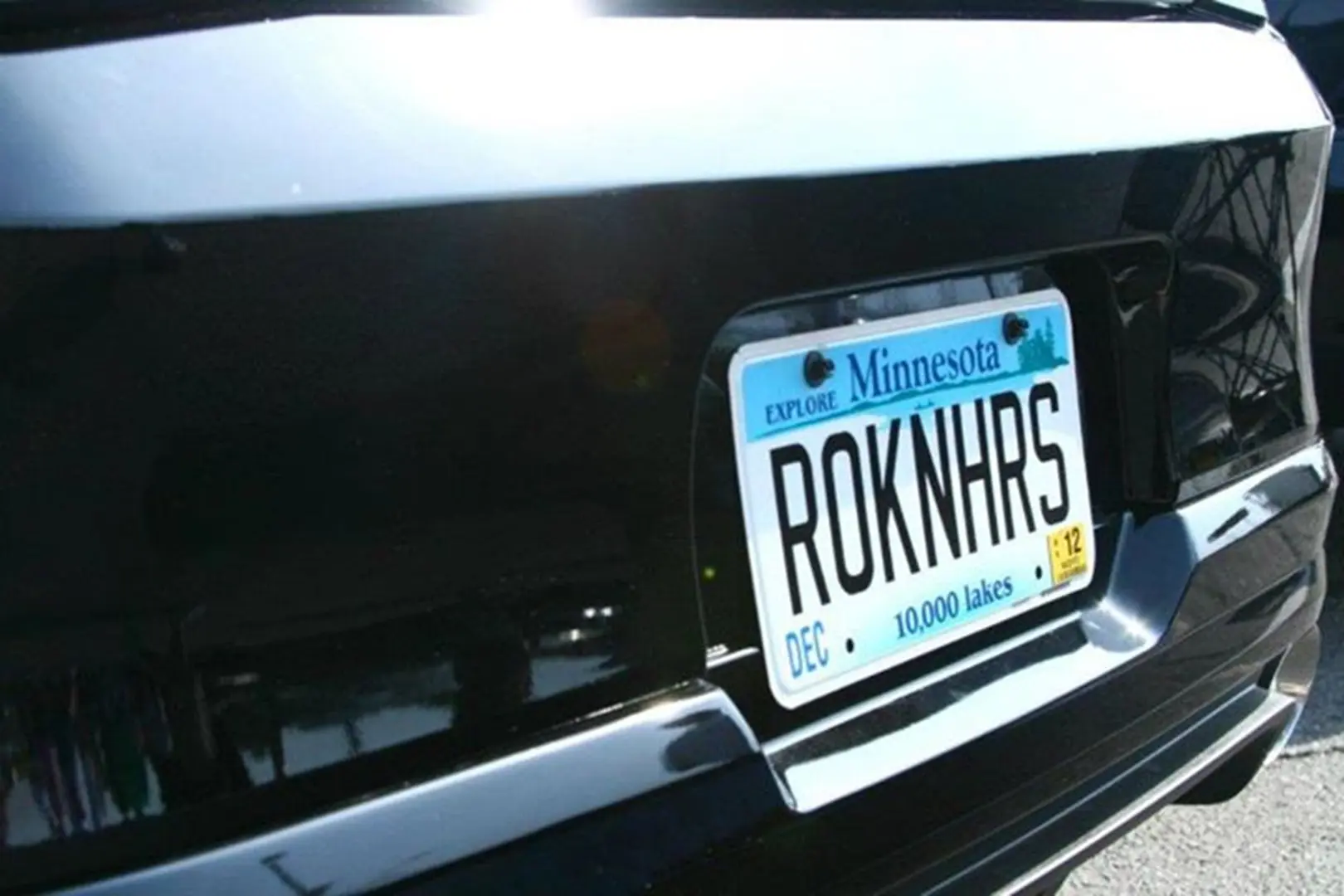 Minnesota license plate on black car