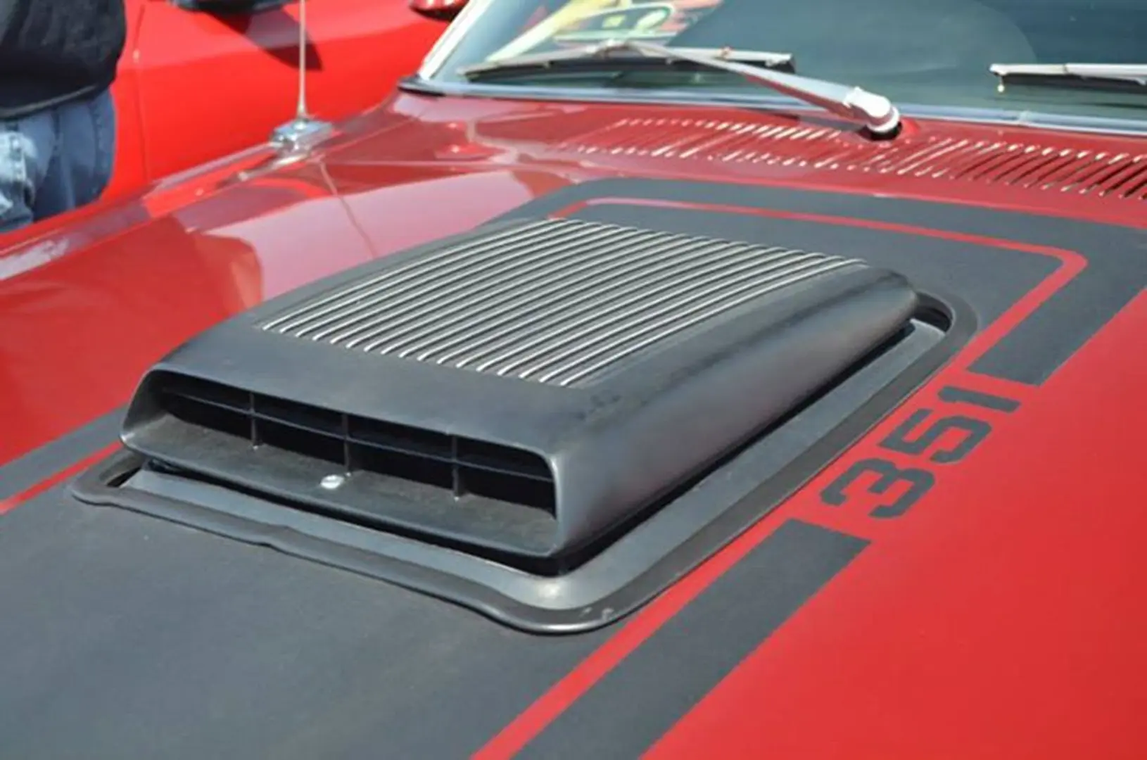 Classic car hood detail with scoop