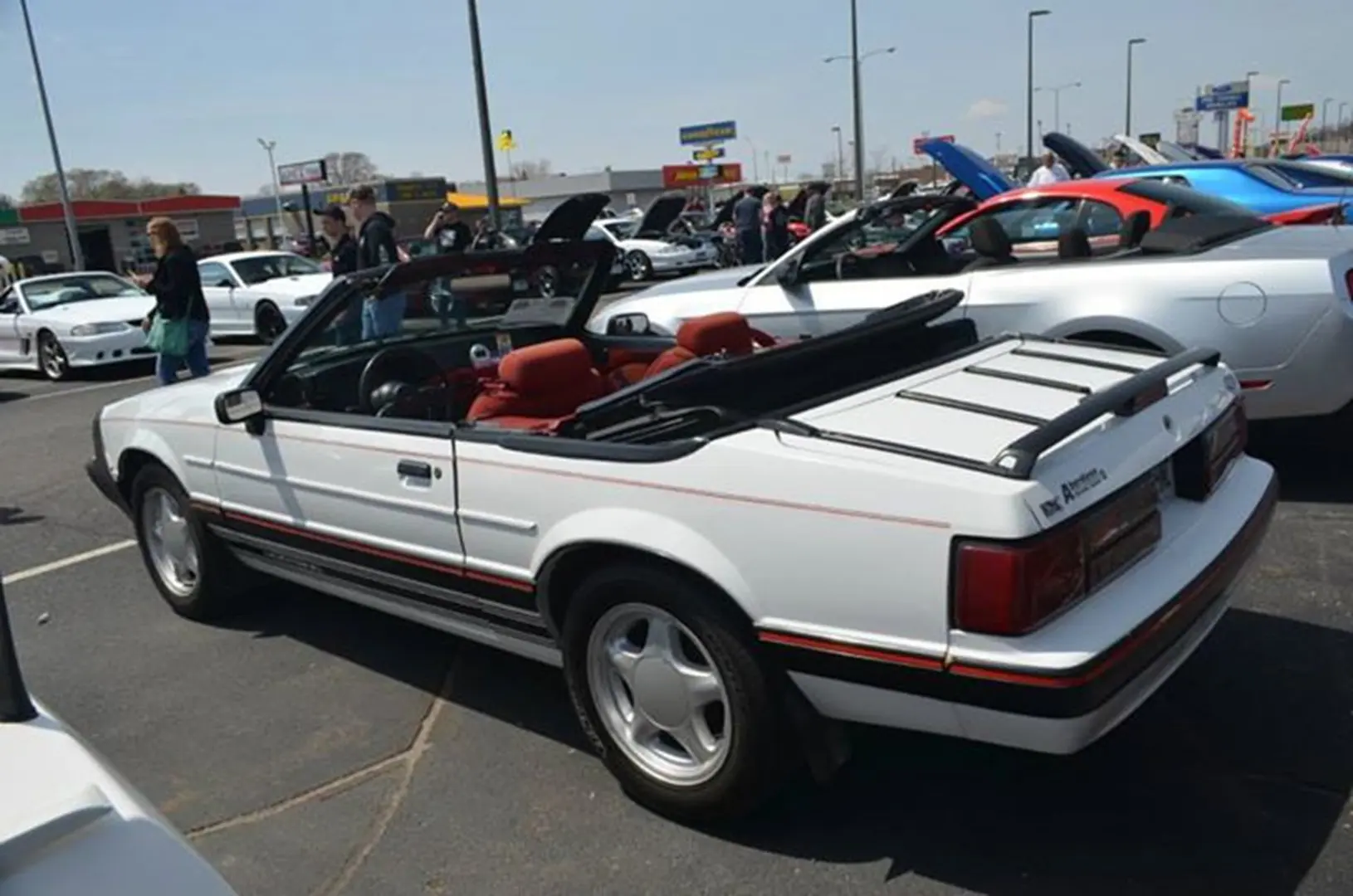 White convertible car at outdoor car show