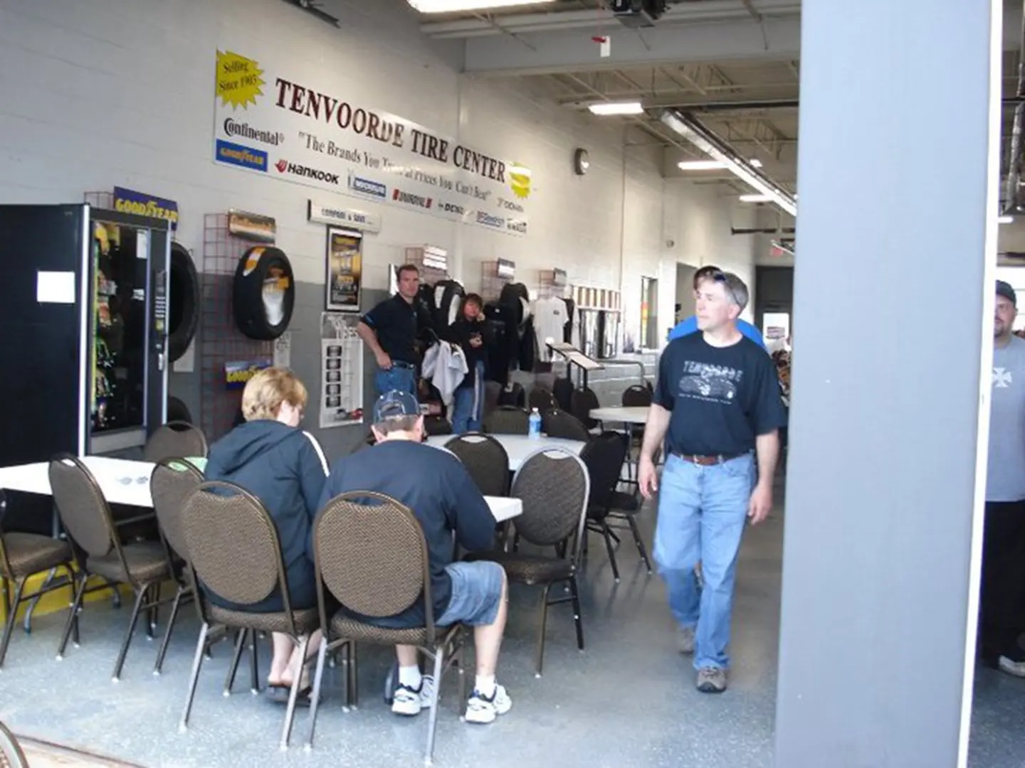 Customers seated in automotive service shop