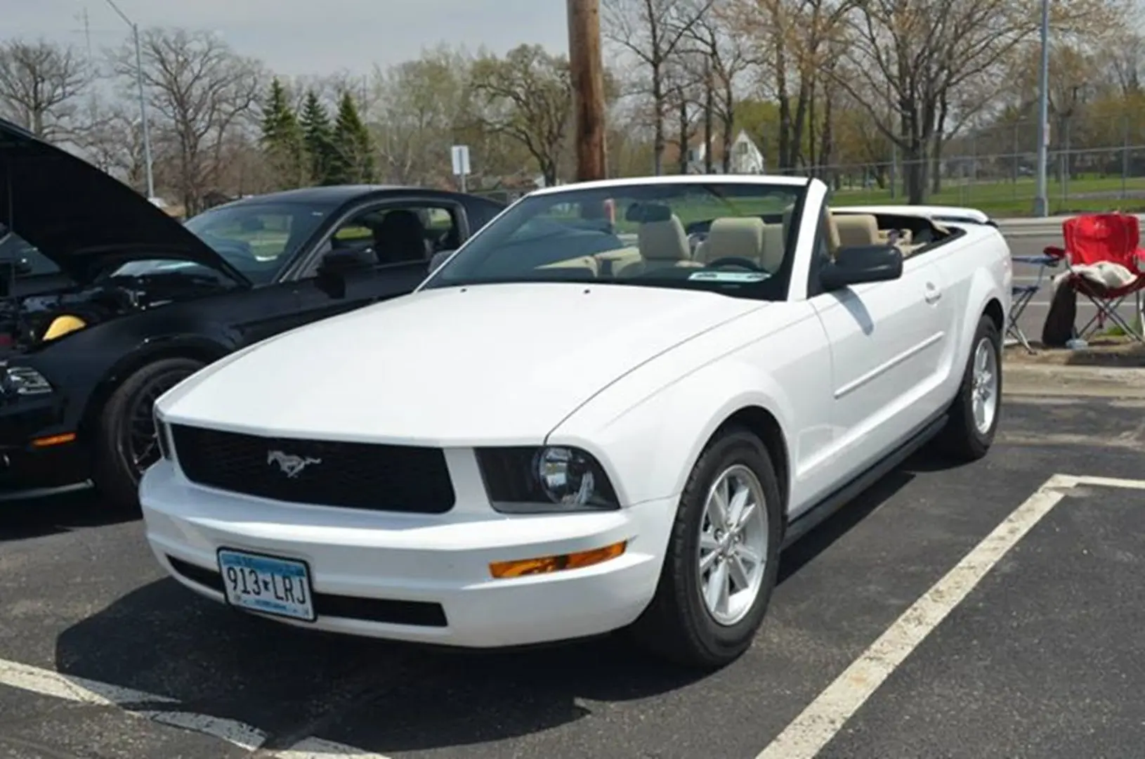 White convertible car parked outdoors