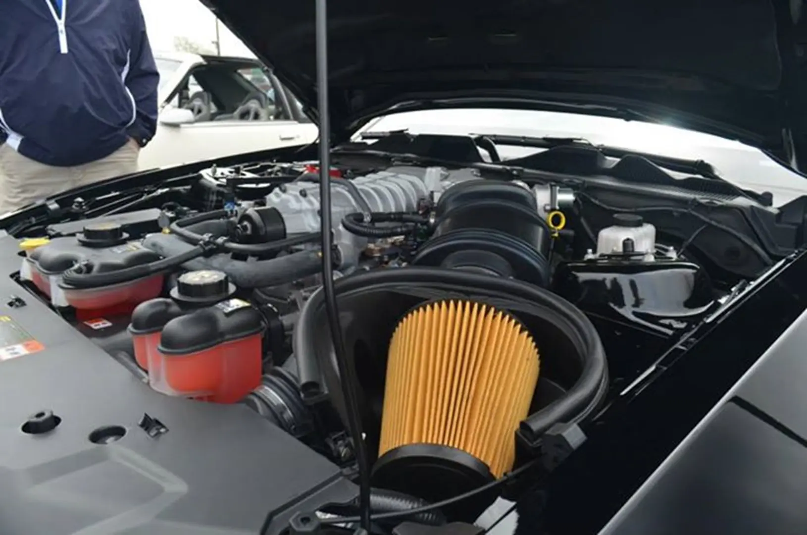 Engine bay with air filter visible
