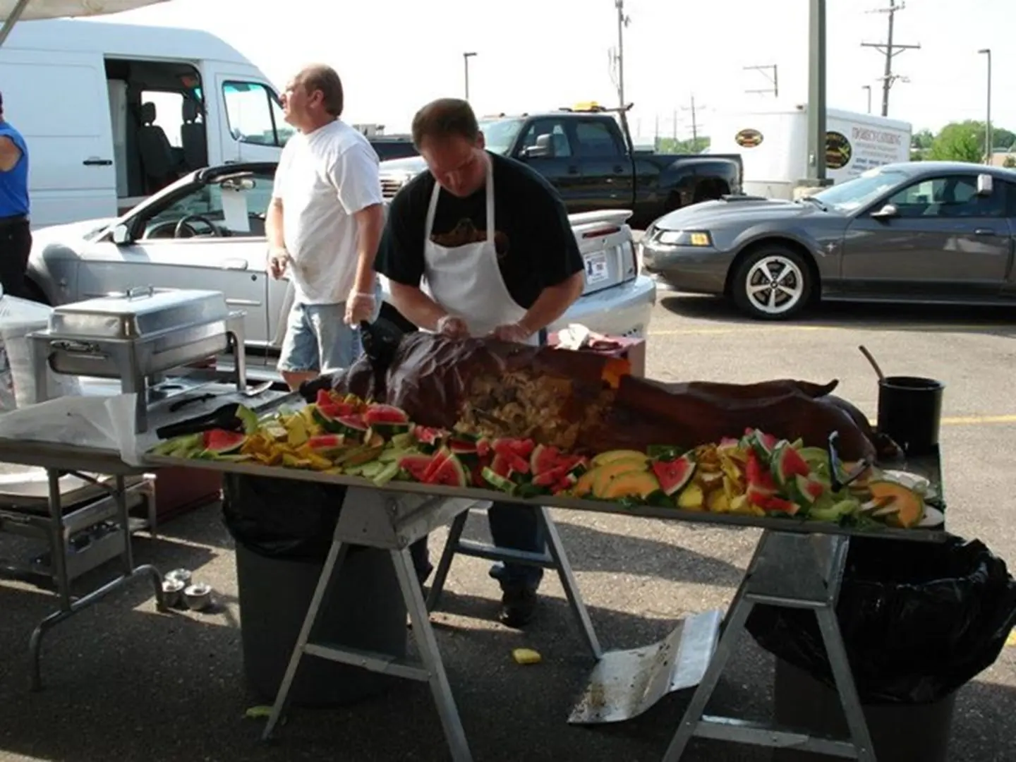 BBQ event with roasted pig centerpiece