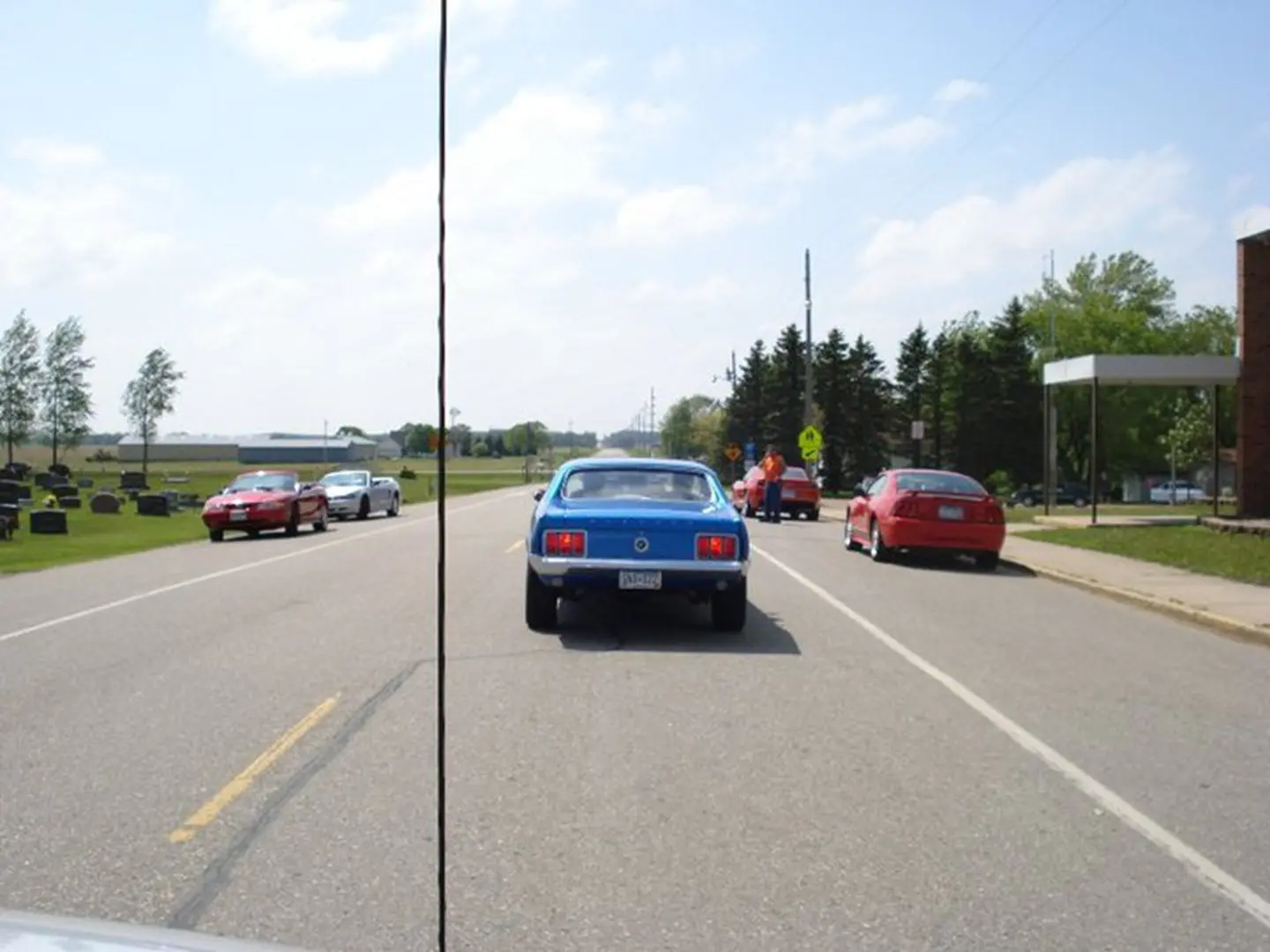 Cars driving on a rural road