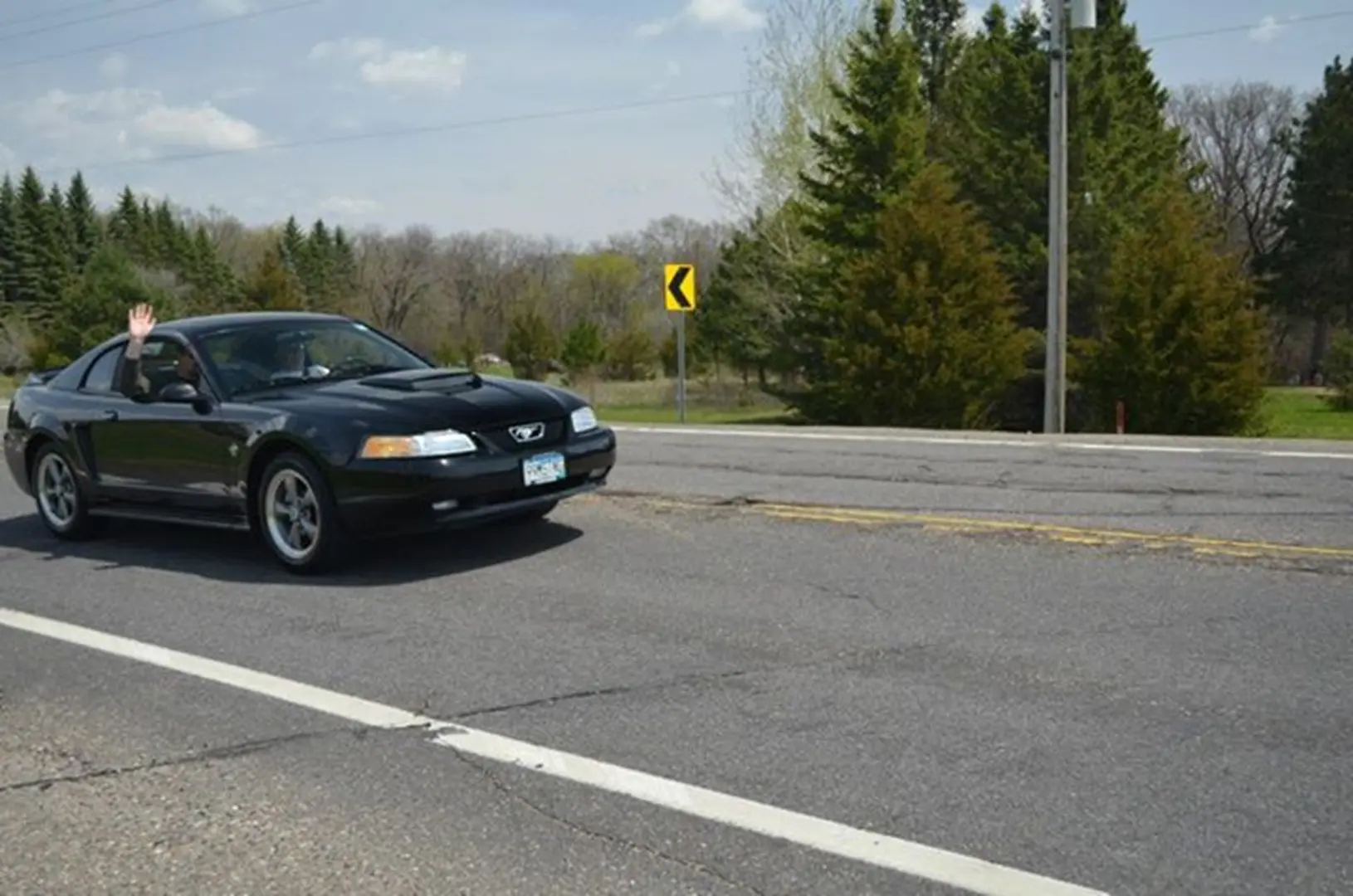 Vehicle on a sunny day road