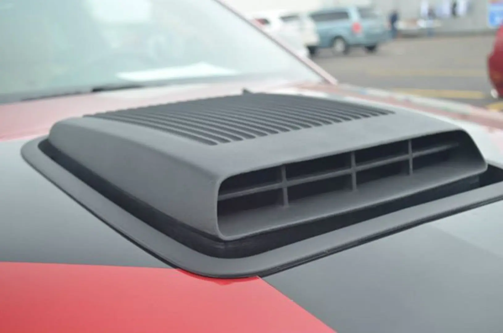 Black hood scoop on vehicle