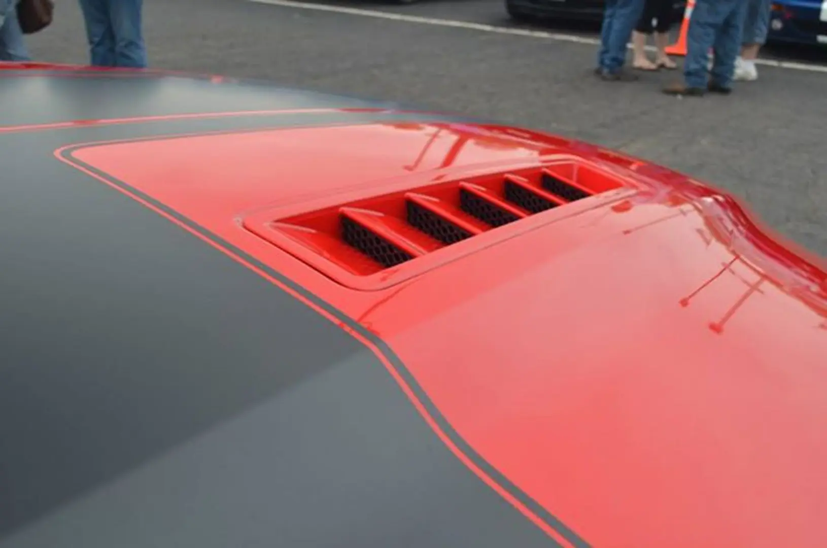 Car hood vent detail in parking lot