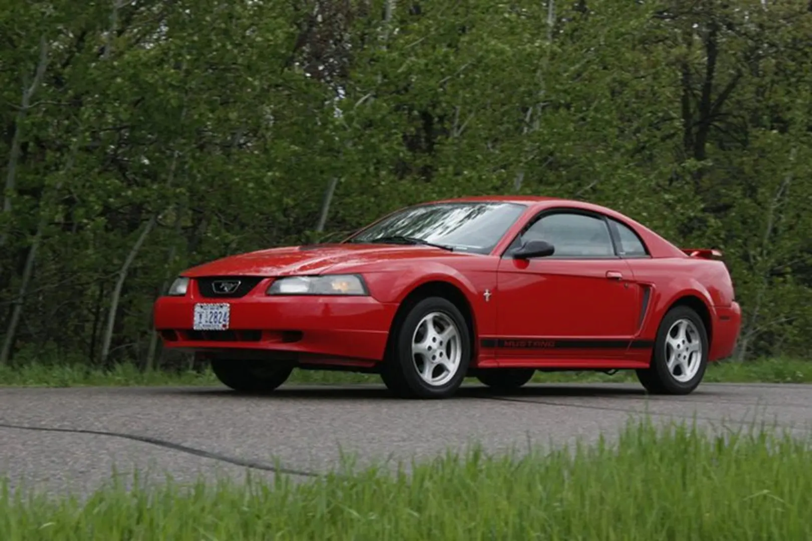 Classic red coupe in motion