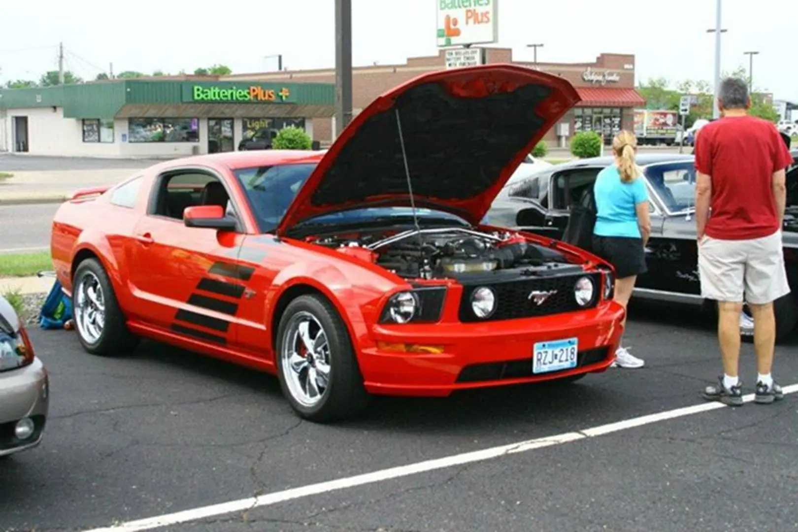 Classic car displayed in parking lot
