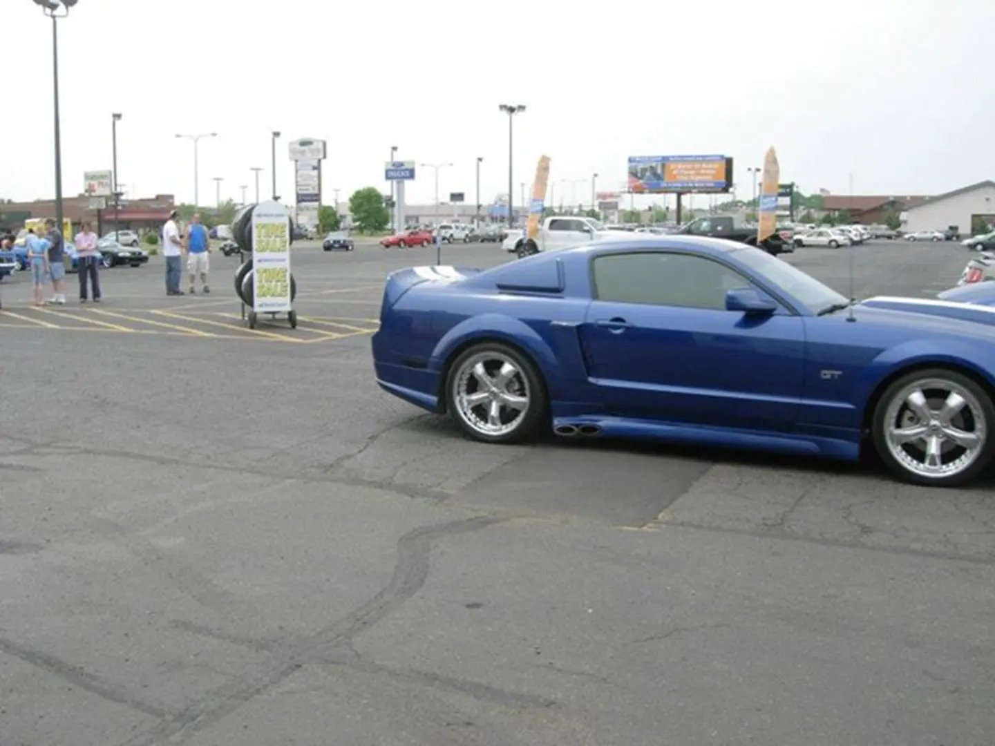Shiny blue sports car parked