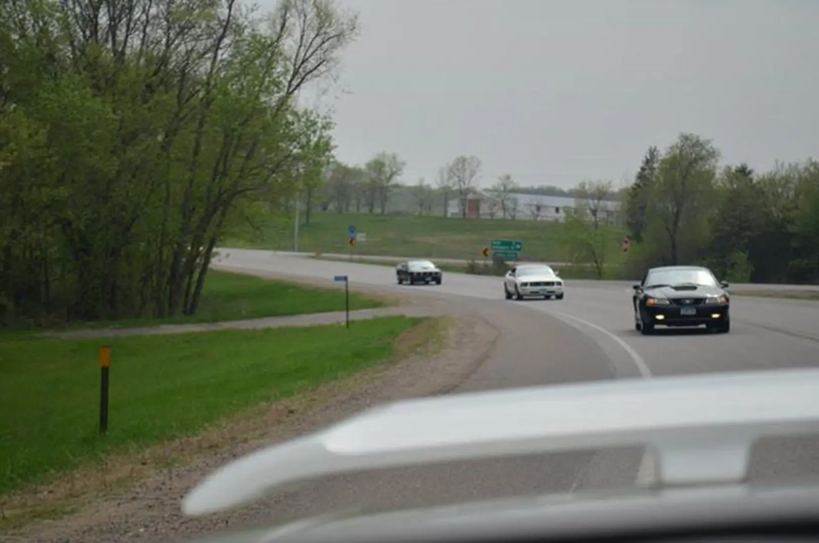 Cars approaching on a curved road