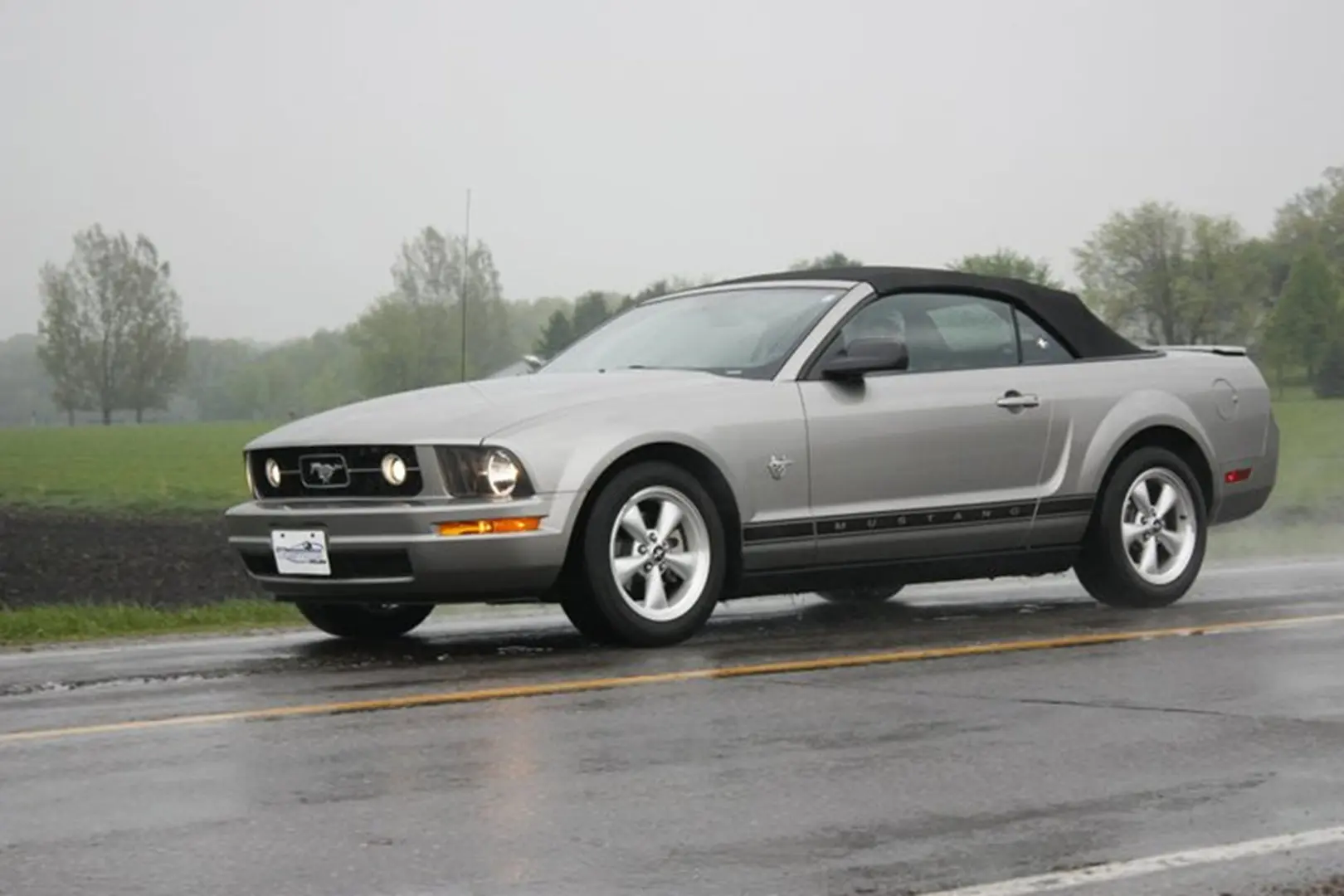 Mustang driving in the rain