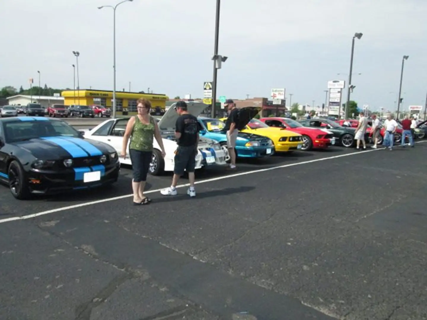 Car show with colorful vehicles lined up