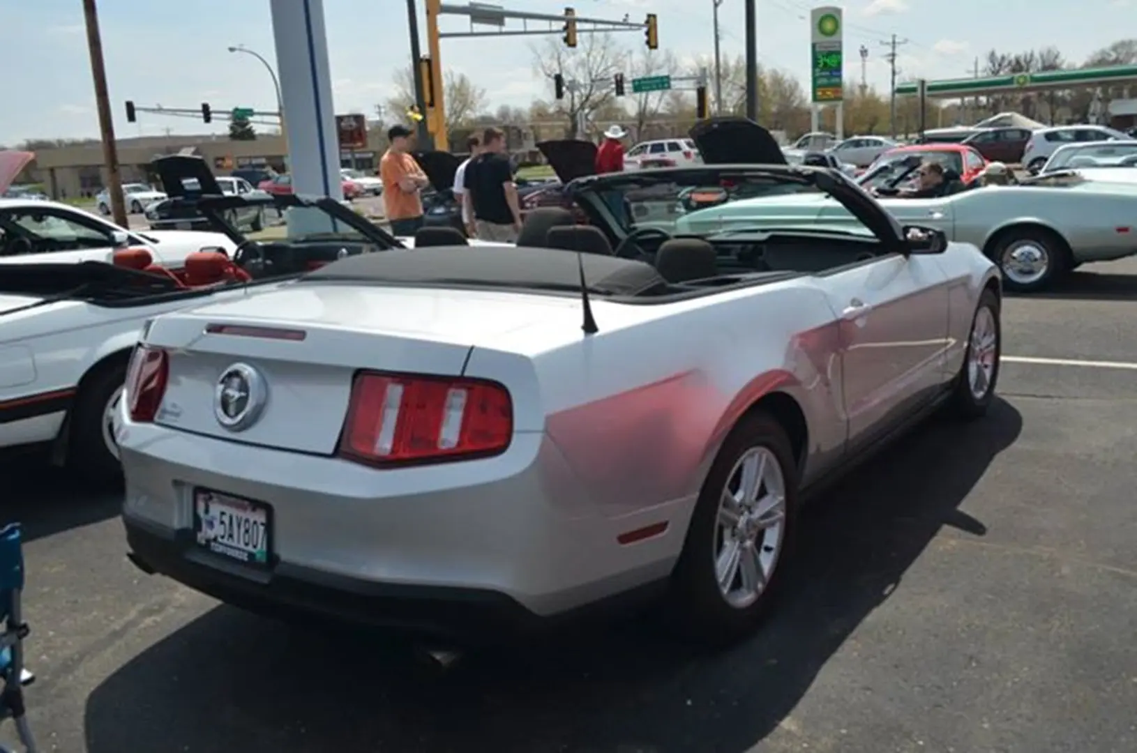Silver convertible at car show