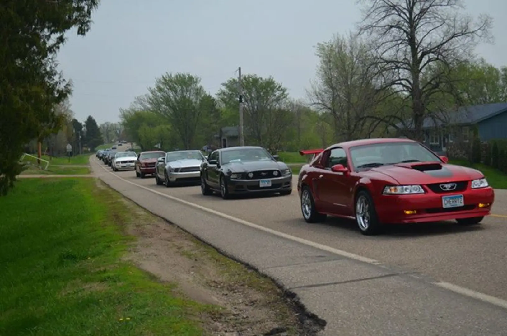 Sports cars driving in a convoy