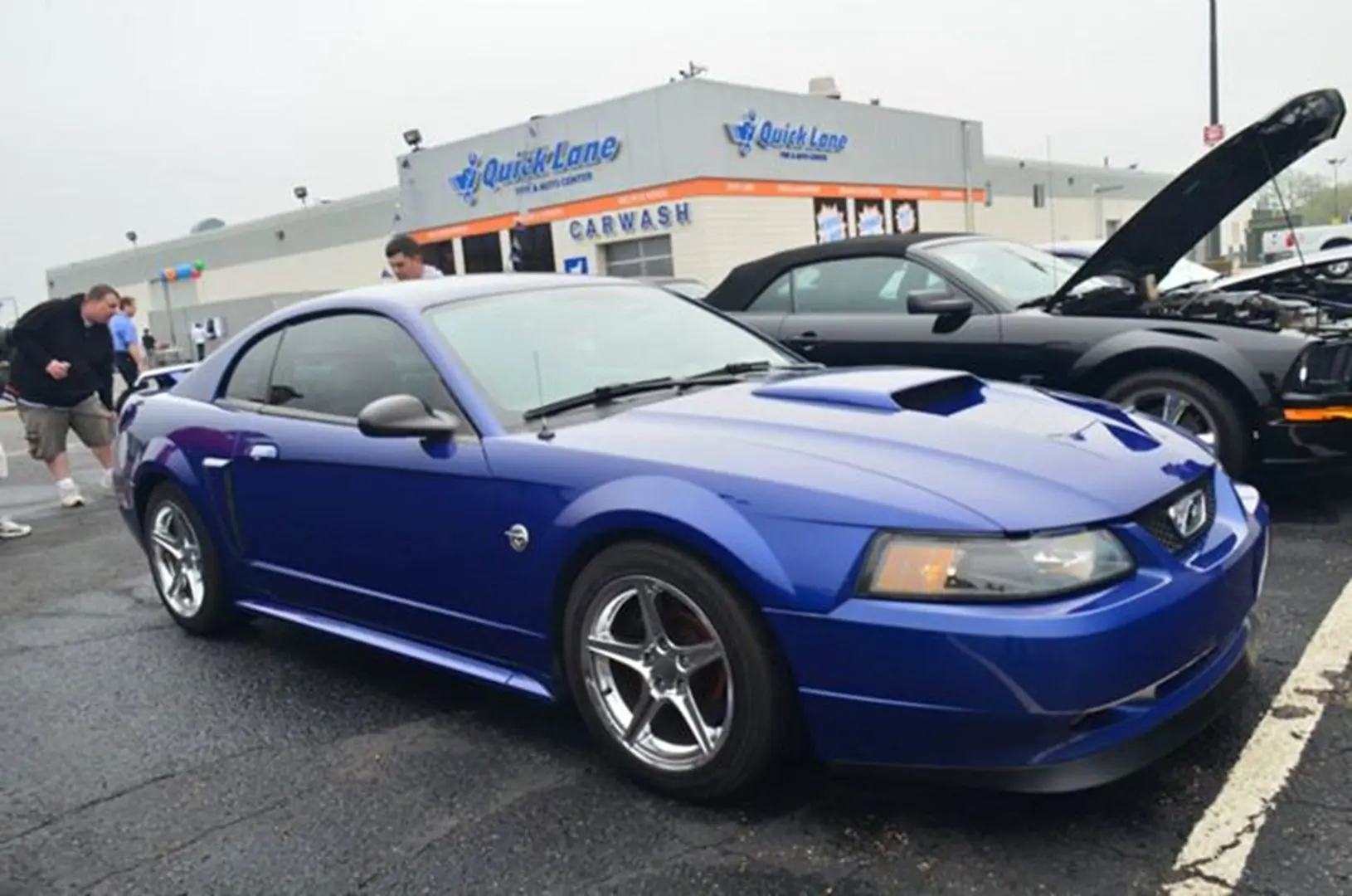 Blue sports car at car wash