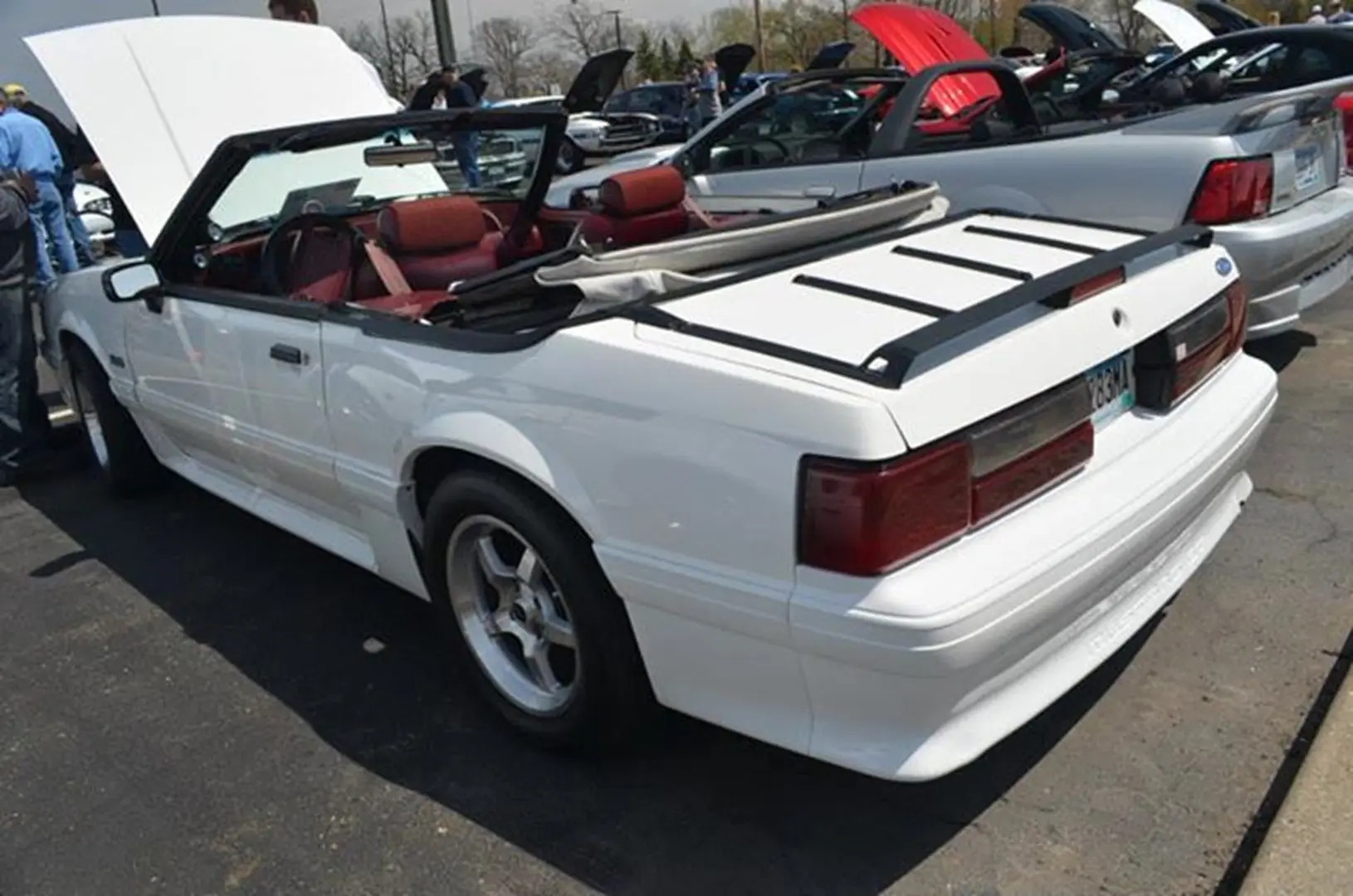 White convertible car at a car show