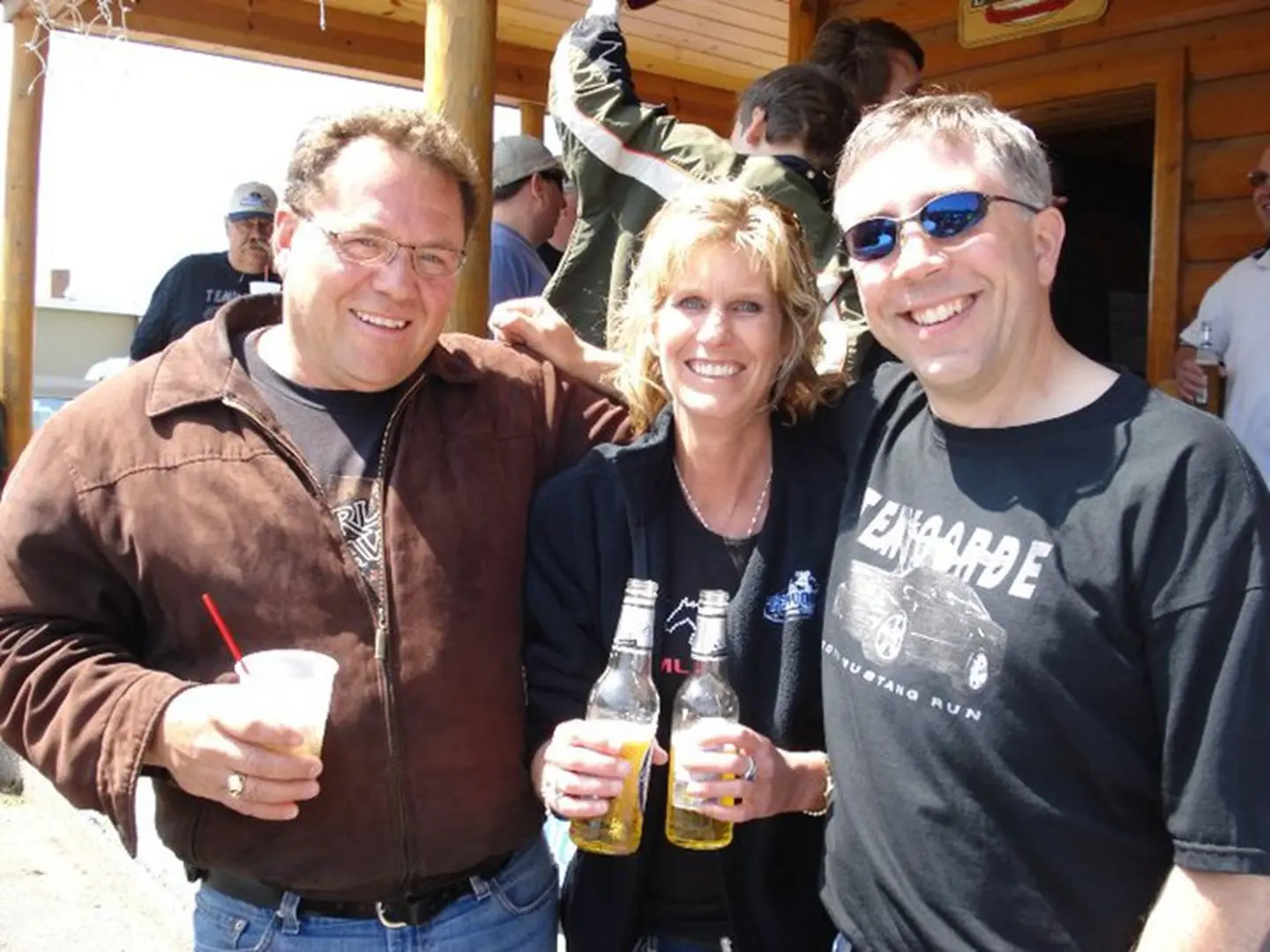 Happy trio with beverages
