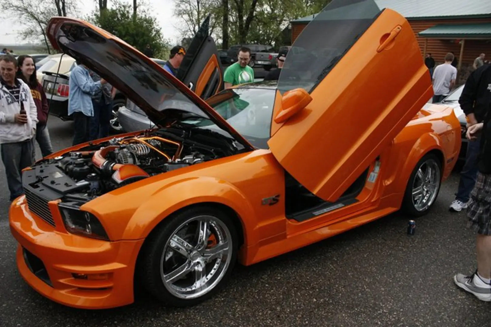 Modified vehicle on display with crowd
