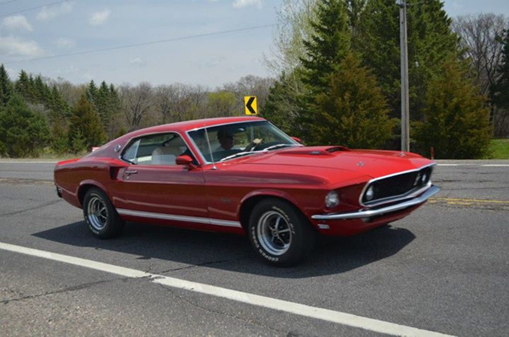 Retro car in motion on highway