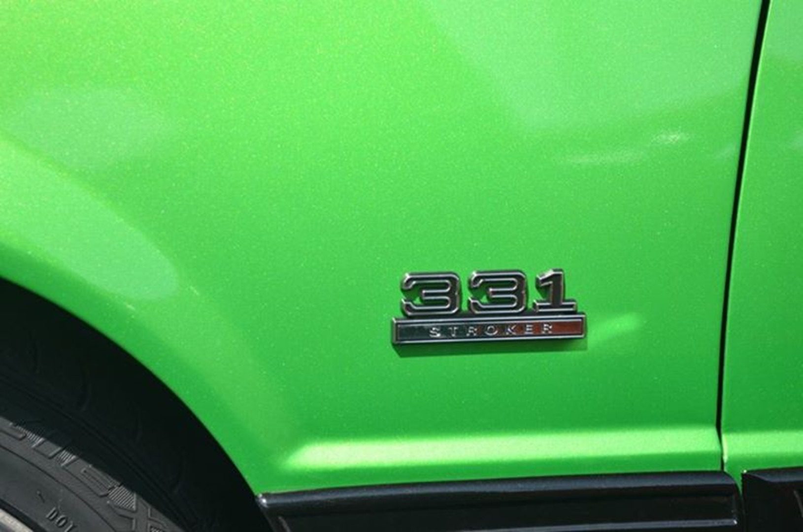 Bright green vehicle showing 331 Stroker logo
