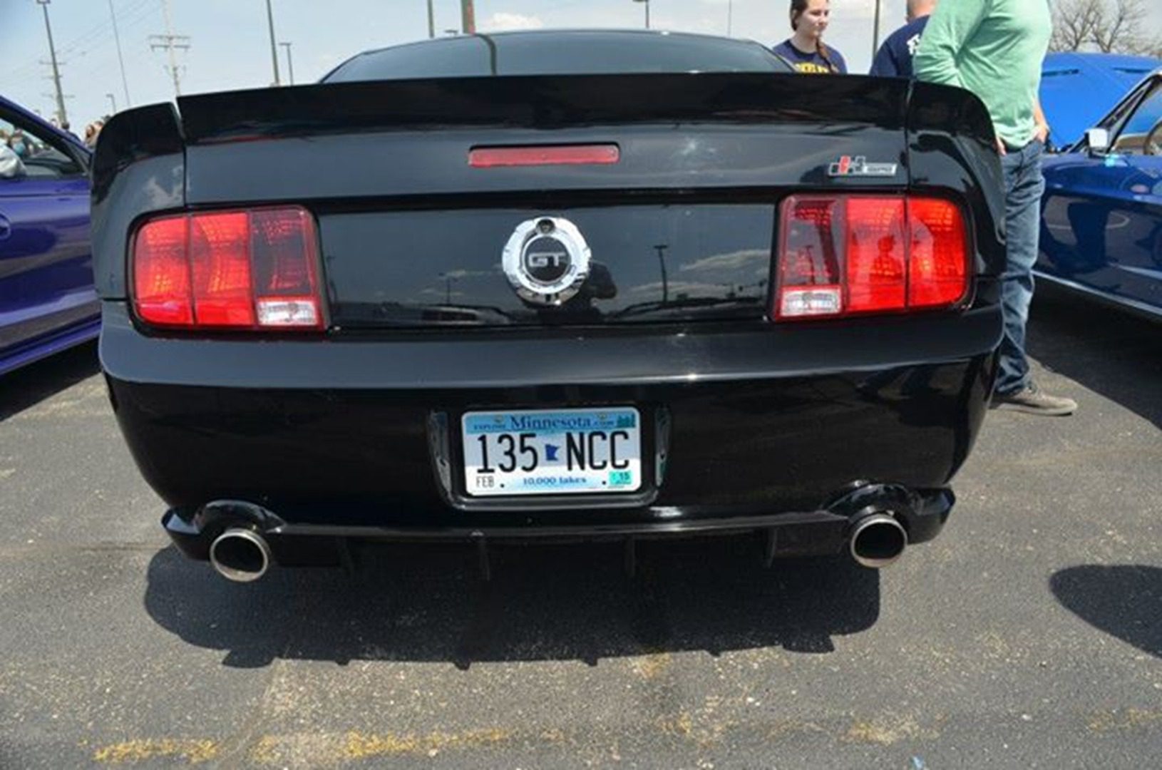 Car show with black Mustang